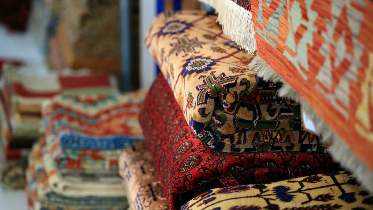 Afghan rugs are a major commodity and the country's second largest non-agricultural export, according to the World Trade Organization. (AFP)