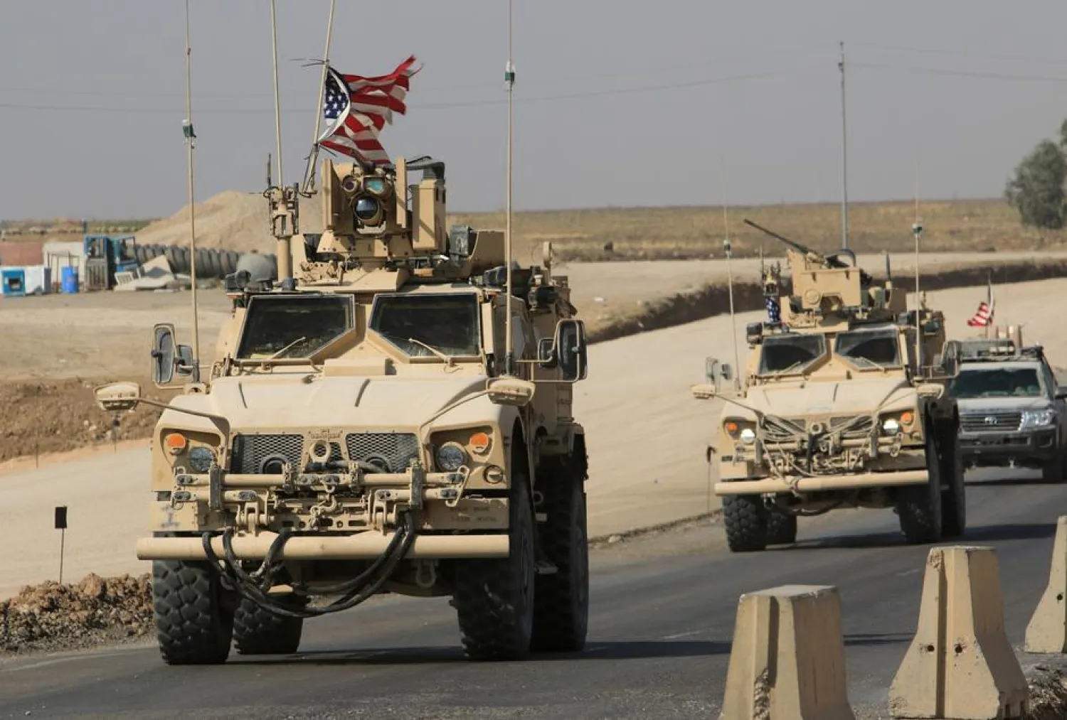 A convoy of US vehicles is seen after withdrawing from northern Syria at the Iraqi-Syrian border crossing in the outskirts of Dohuk, Iraq, on October 21, 2019. REUTERS/Ari Jalal