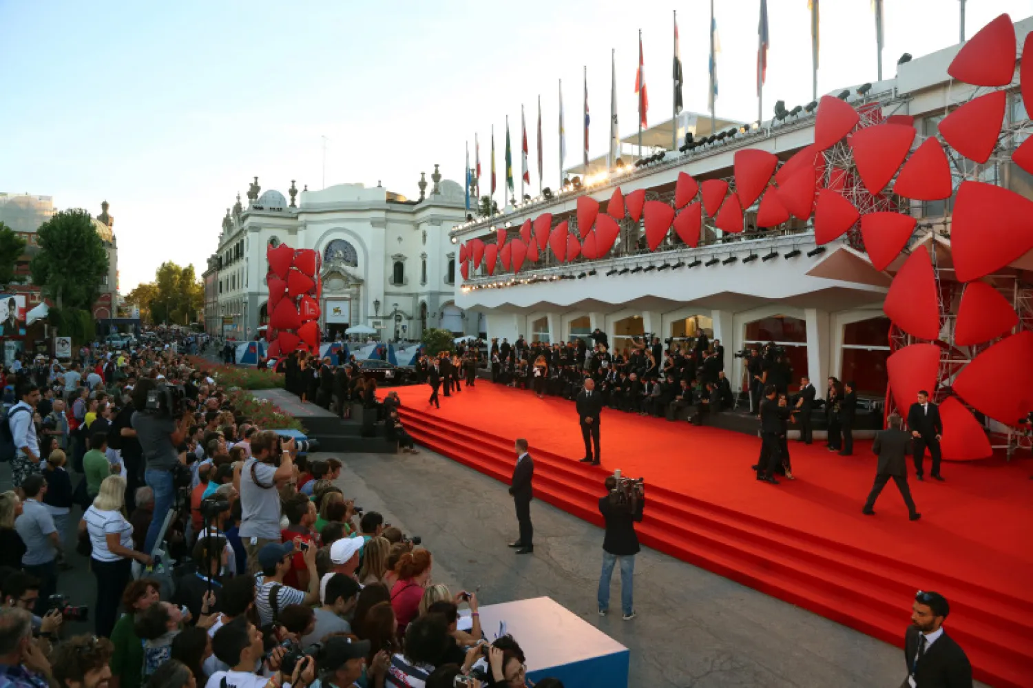 Atmosphere in front of the Palazzo del Cinema during the 71st Venice Film Festival in Venice. Hubert Boesl/picture-alliance/dpa/AP Images