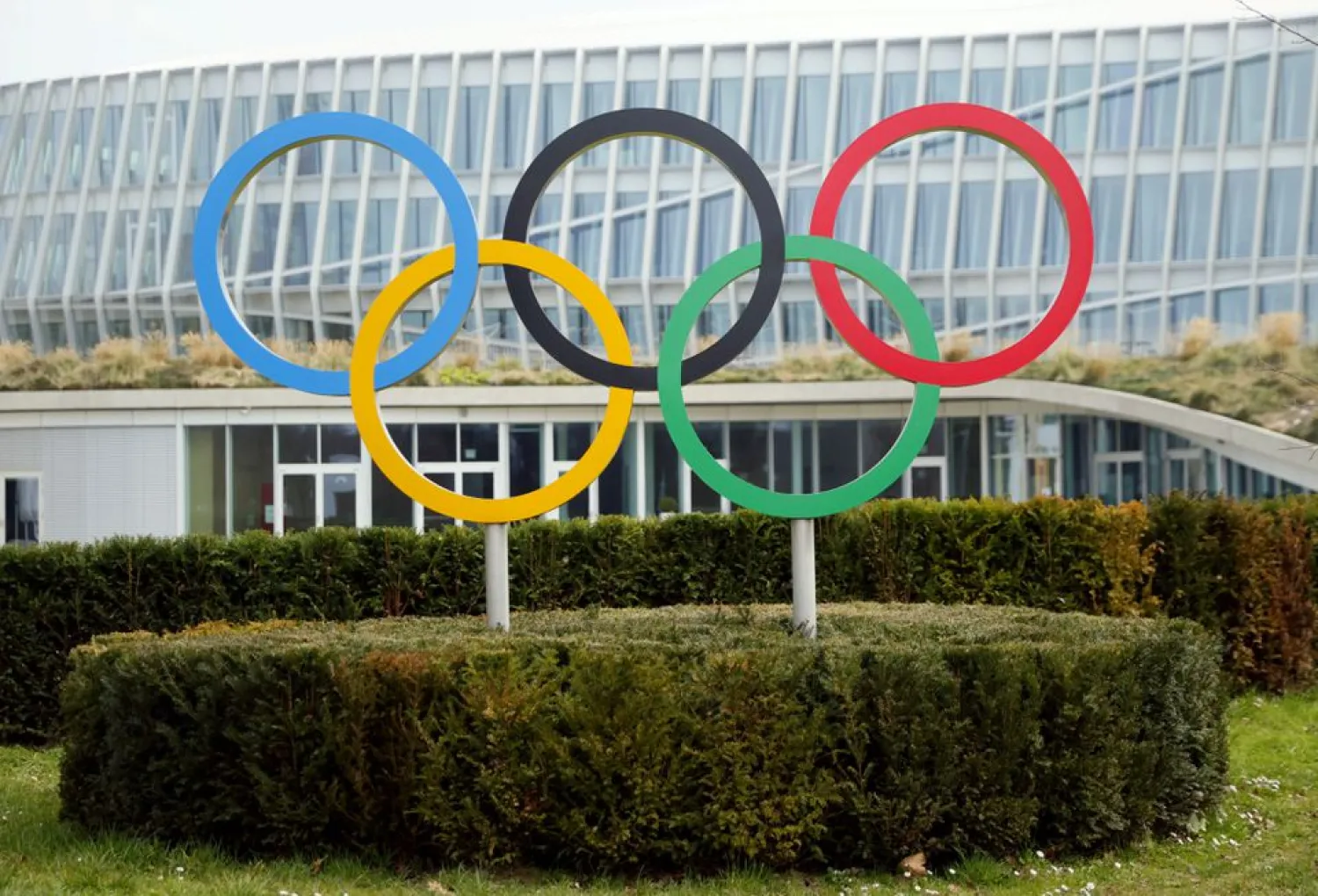 The Olympic rings are pictured in front of the International Olympic Committee (IOC) headquarters in Lausanne, Switzerland, March 9, 2021. REUTERS/Denis Balibouse/File Photo