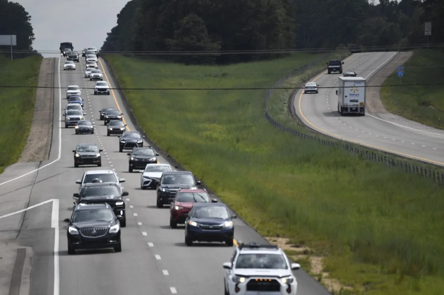 Residents drive north (L) towards Magnolia, Mississippi, as they evacuate away from New Orleans ahead of Hurricane Ida. (AFP)