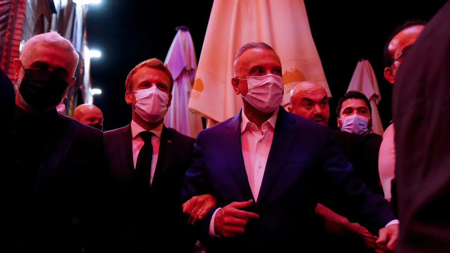 Macron visits the Shiite Muslim shrine of Imam Musa Al-Kadhim in northern Baghdad district of Kadhimiya, accompanied by Iraqi Prime Minister Mustafa al-Kadhimi. (AFP)