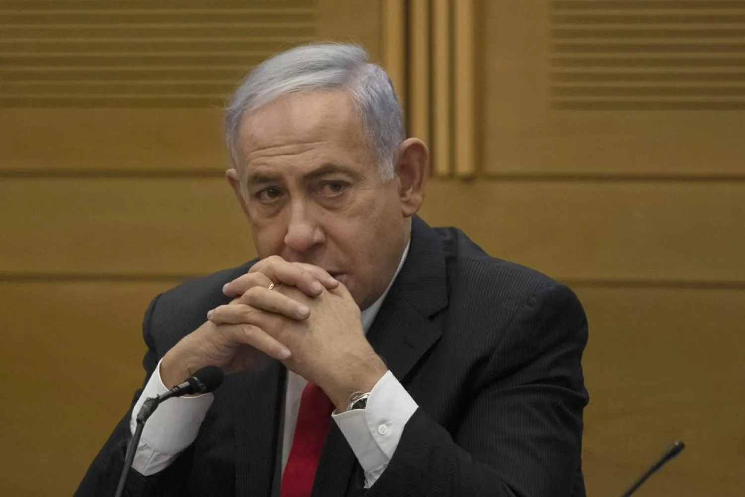 In this June 14, 2021 file photo, former Israeli Prime Minister Benjamin Netanyahu speaks to right-wing opposition party members, at the Knesset, Israel's parliament, in Jerusalem. (AP)