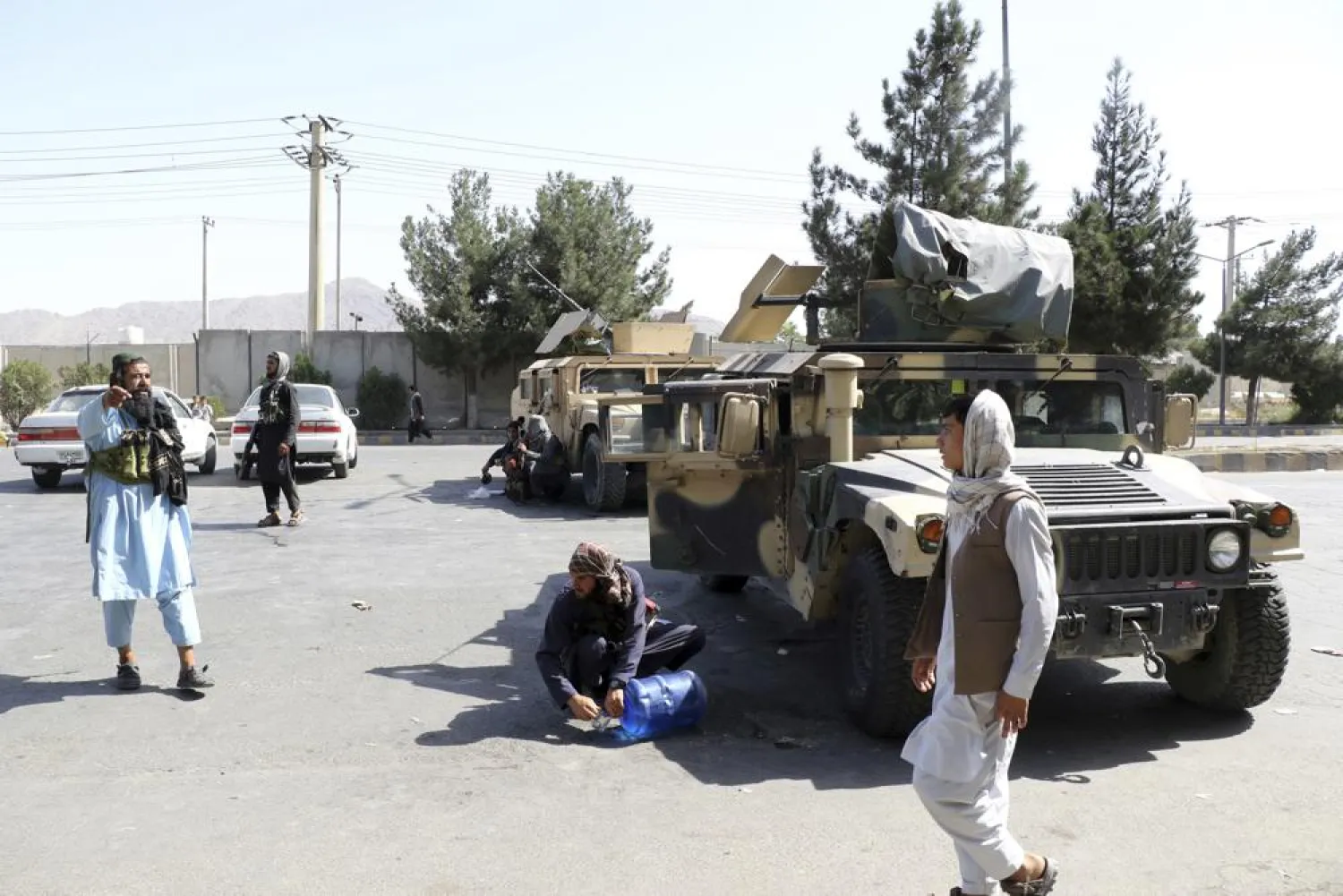 Taliban fighters stand guard outside the airport after Thursday's deadly attacks, in Kabul, Afghanistan, Friday, Aug. 27, 2021. (AP)