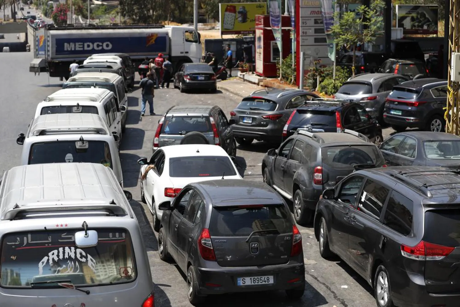 Vehicles wait in long queues for gasoline in Beirut, Lebanon, Friday, June 25, 2021. (AP Photo/Hussein Malla)
