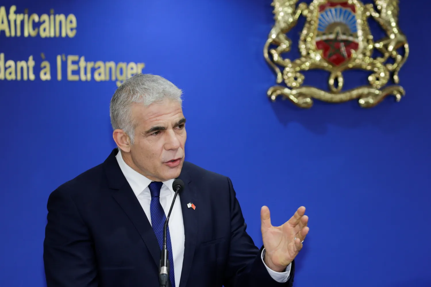 Israeli Foreign Minister Yair Lapid speaks during a news conference as he meets with Moroccan Foreign Minister Nasser Bourita in Rabat, Morocco August 11, 2021. REUTERS/Youssef Boudlal