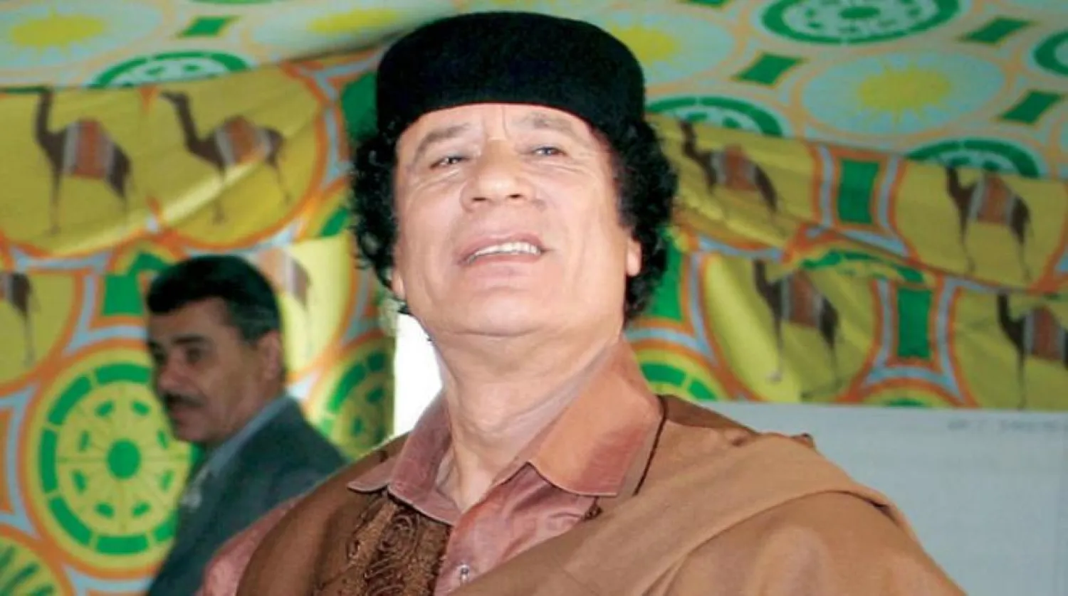 Muammer Kaddafi.