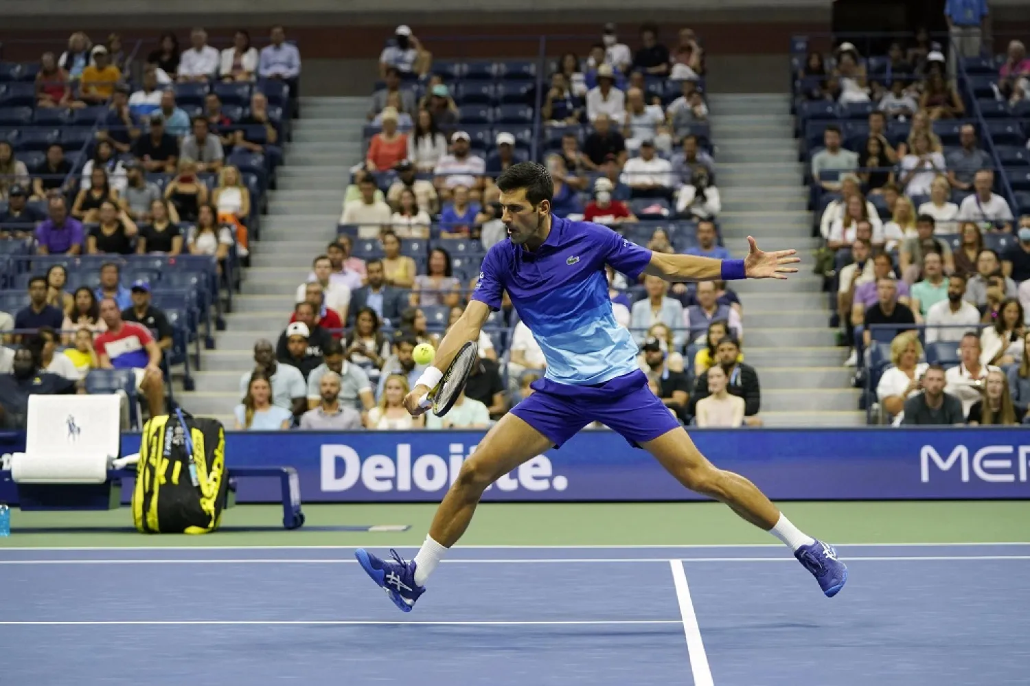 Novak Djokovic, of Serbia, returns a shot during the first round of the US Open tennis championships, Tuesday, Aug. 31, 2021, in New York. (AP)