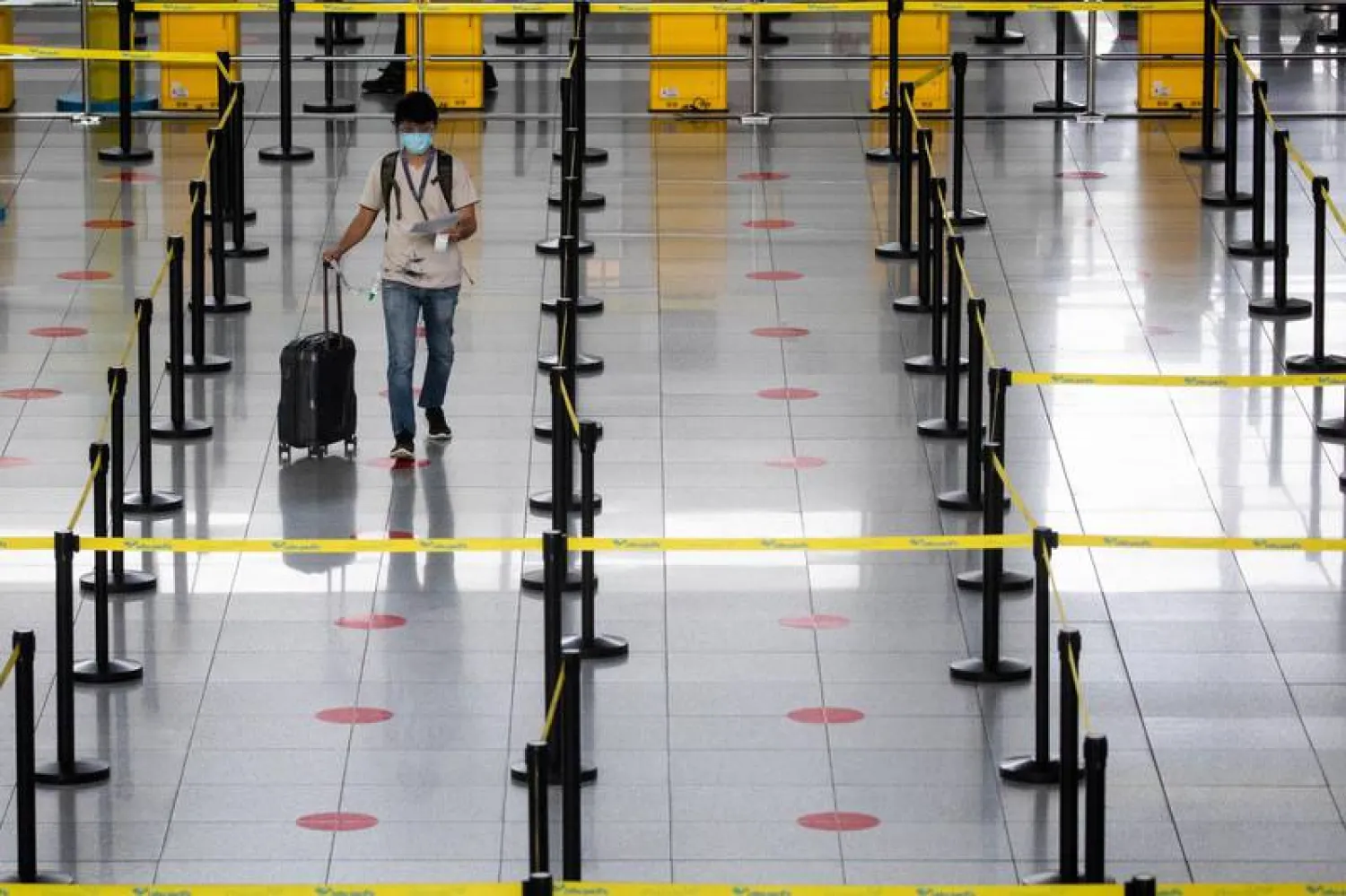 Passengers are not able to travel between the UAE and the Philippines if their journey originates in the UAE, and this includes Filipino nationals. Pictured is Manila's international airport amid the pandemic. Reuters
