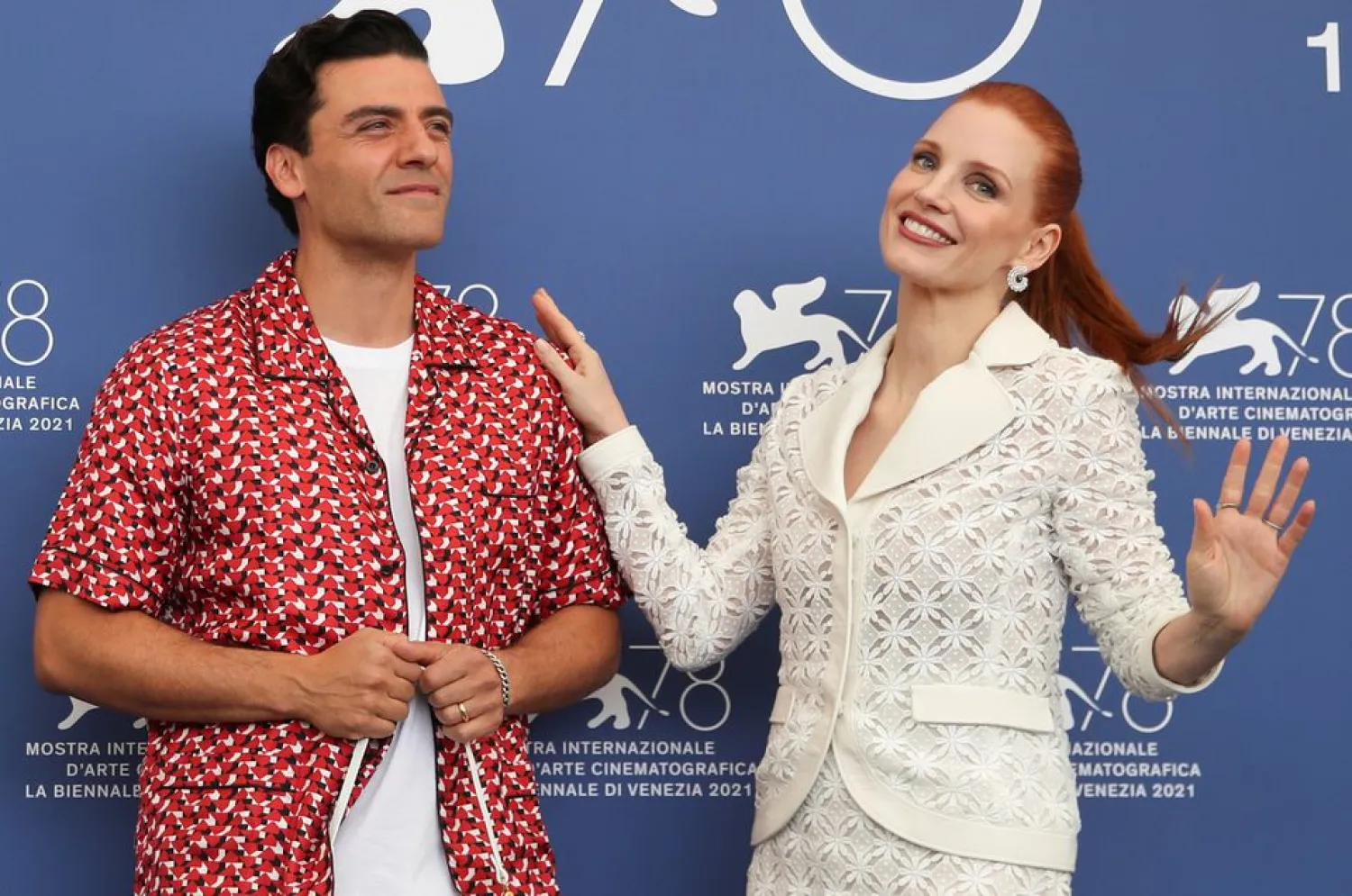 Actors Oscar Isaac and Jessica Chastain pose at a photo call for "Scenes from A Marriage" at the Venice Film Festival, September 4, 2021. (Reuters)