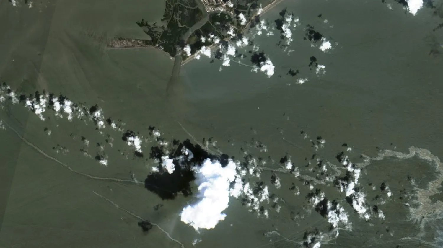 In a satellite image provided by Maxar Technologies, an oil slick is shown on Sept. 2, 2021 south of Port Fourchon, La. The US Coast Guard said Saturday, Sept. 4, that cleanup crews are responding to a sizable oil spill in the Gulf of Mexico following Hurricane Ida. (Maxar Technologies via AP)
