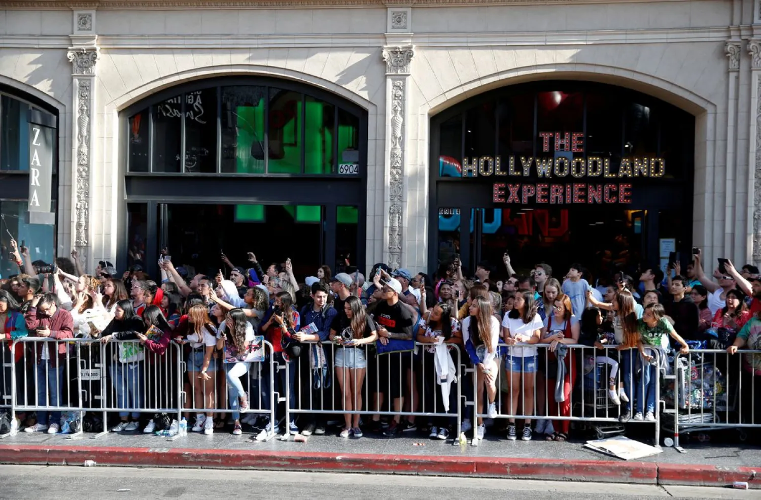 Fans line up along a closed Hollywood Blvd. across from the TCL Chinese Theatre during the World Premiere of Marvel Studios' "Spider-man: Far From Home" in Los Angeles, California, U.S., June 26, 2019. REUTERS/Danny Moloshok/File Photo