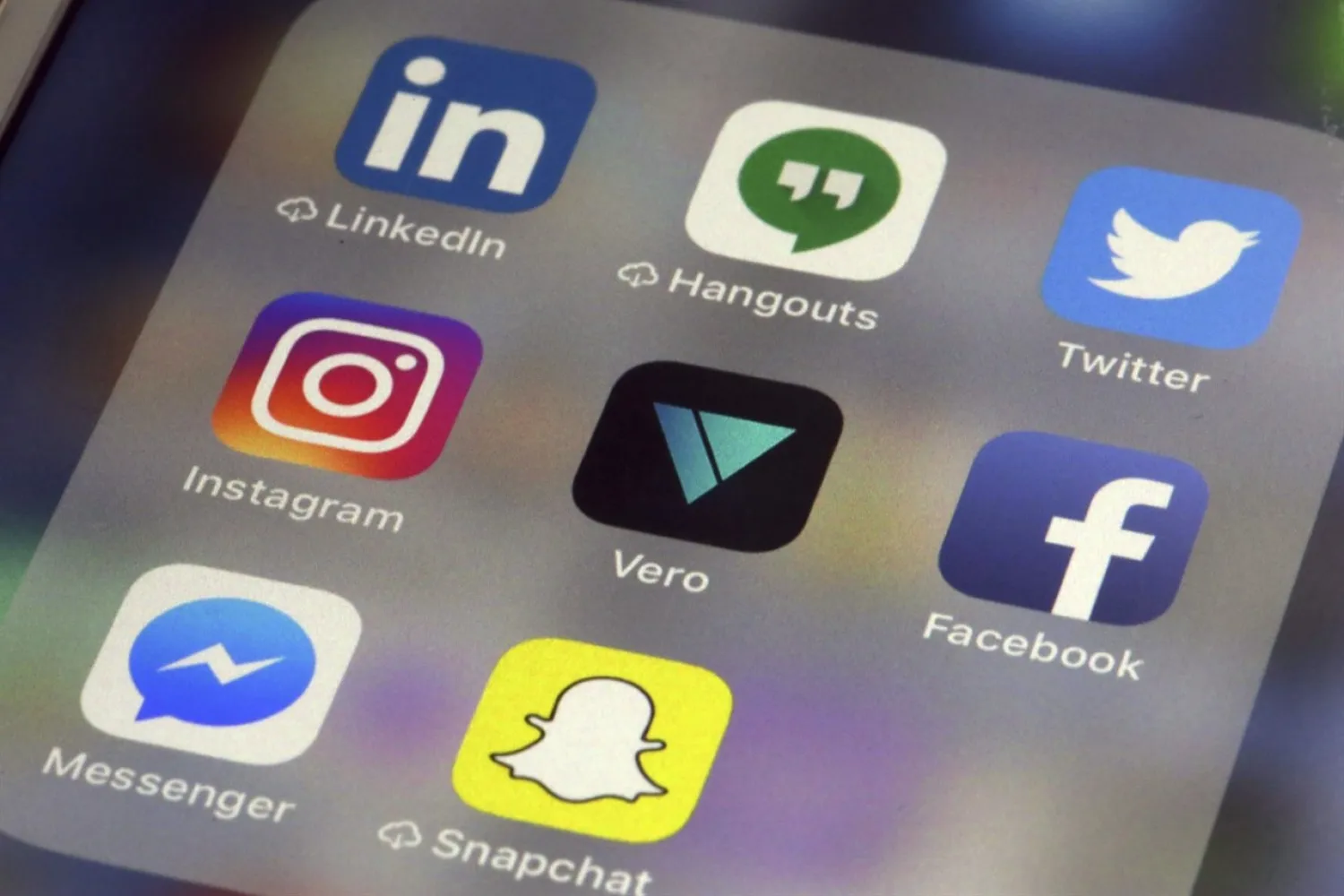 Several apps are displayed on an iPhone on March 1, 2018. THE CANADIAN PRESS/AP/Richard Drew