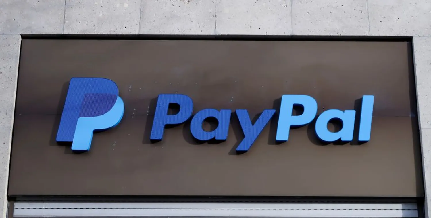 The PayPal logo is seen at an office building in Berlin, Germany, March 5, 2019. (Reuters)