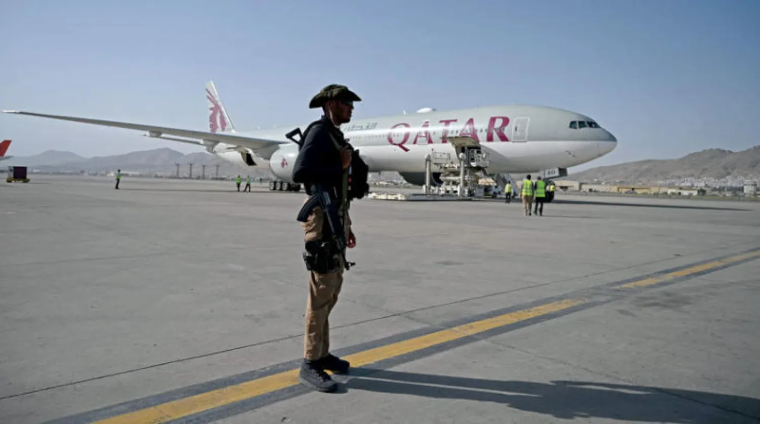 مغادرة نحو 200 أجنبي أمس على متن رحلة للخطوط الجوية القطرية الى الدوحة (أ.ف.ب)