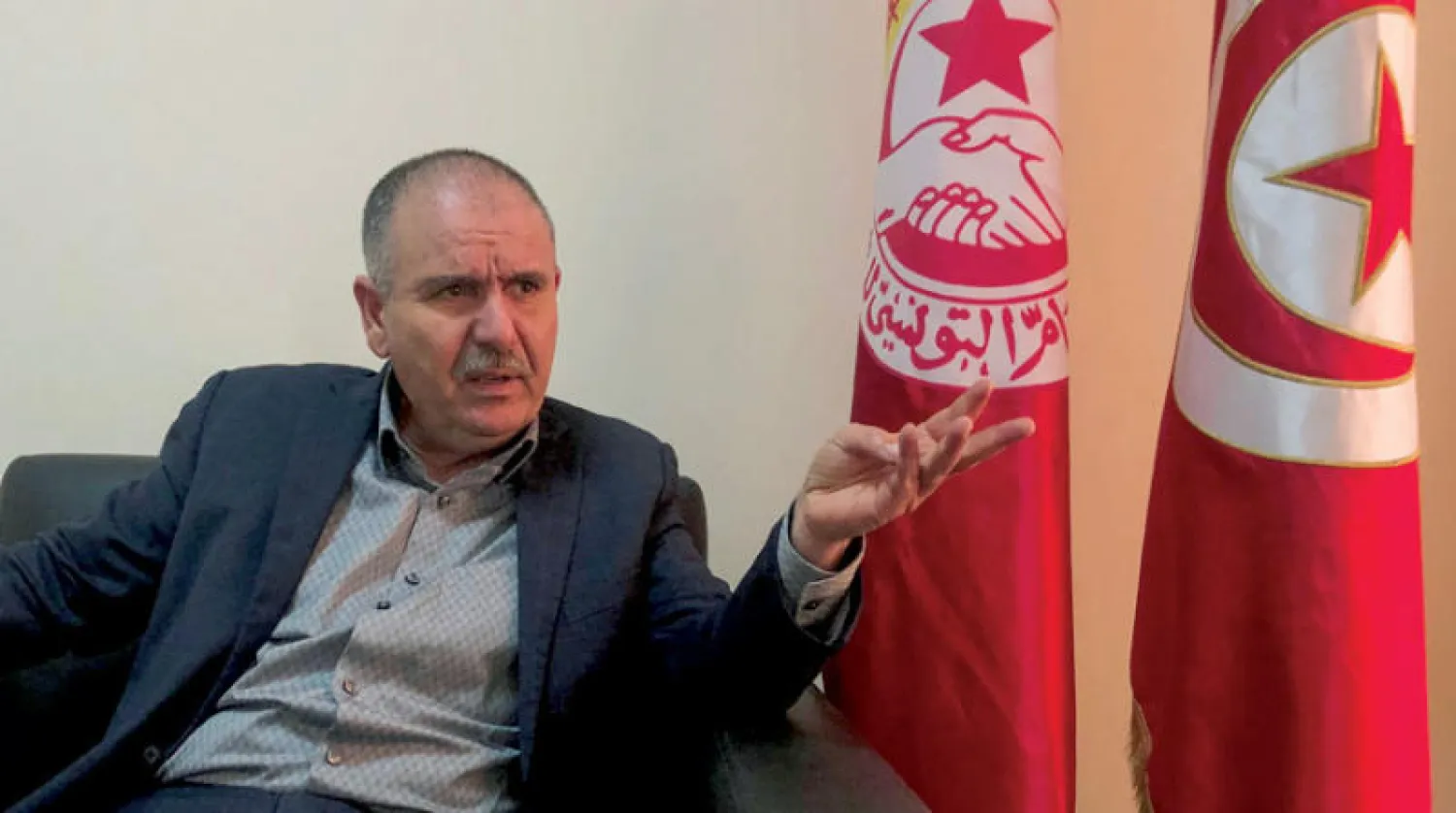 نور الدين الطبوبي رئيس نقابات العمال في تونس (رويترز)