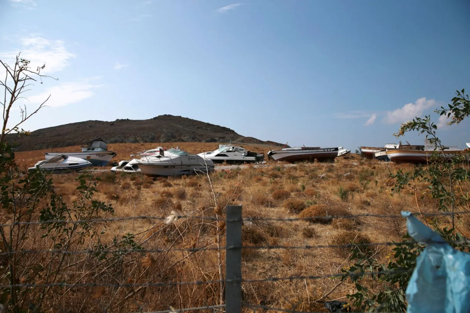 Abandoned speedboats, used by refugees and migrants to cross part of the Aegean Sea from Turkey to Greece, are seen at a garbage dump site near the town of Mithymna. Reuters file photo