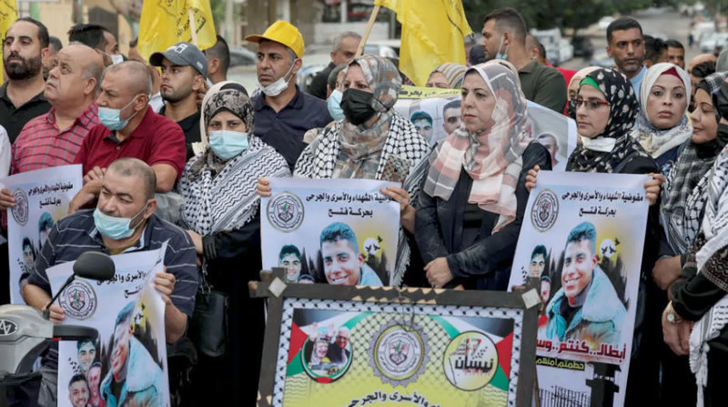إحباط يسود الفلسطينيين بعد اعتقال الأسرى الأربعة ومظاهرات مؤيدة لهم ولمنحهم الحصانة