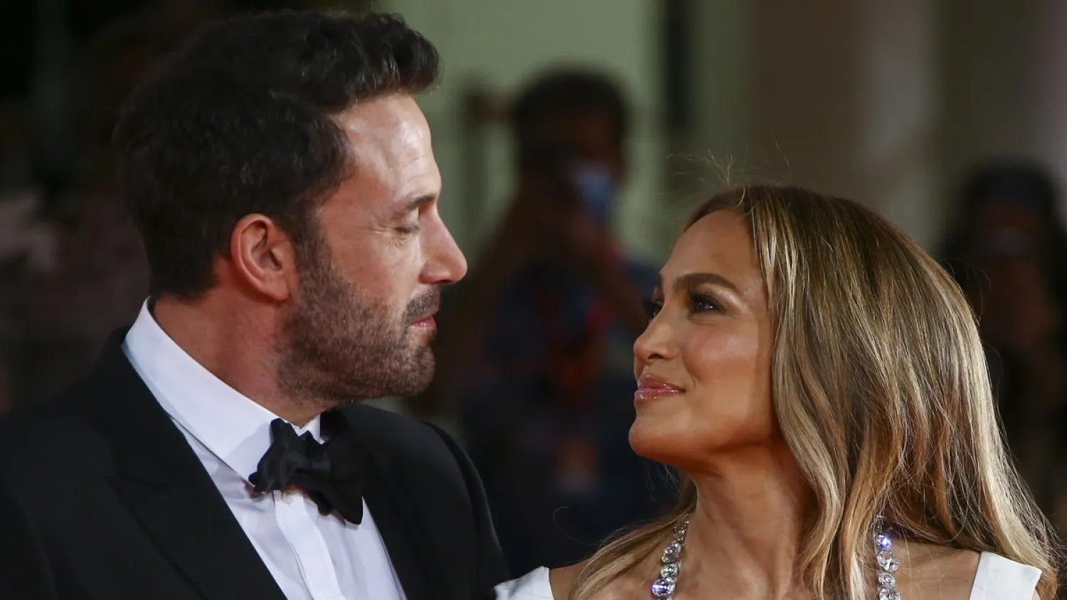 Jennifer Lopez, right, and Ben Affleck pose for photographers upon arrival at the premiere of the film 'The Last Duel' during the 78th edition of the Venice Film Festival in Venice, Italy, Friday, Sept. 10, 2021.(Source: Joel C Ryan/Invision/AP)