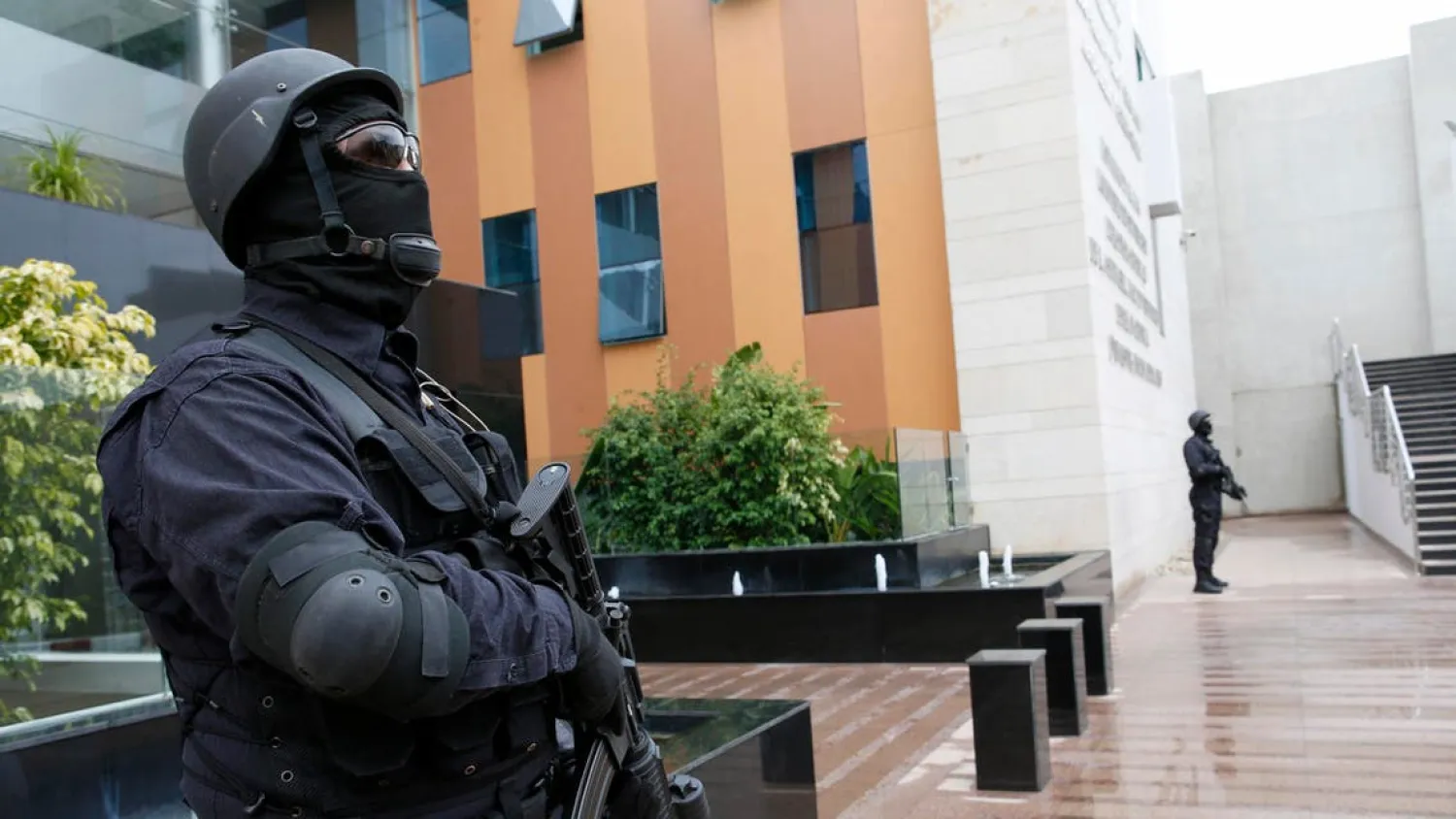 A file photo shows members of the Moroccan special anti-terror unit guard the headquarters of the Central Bureau of Judicial Investigations in Sale near Rabat, Morocco, Jan. 5, 2016. (AP)