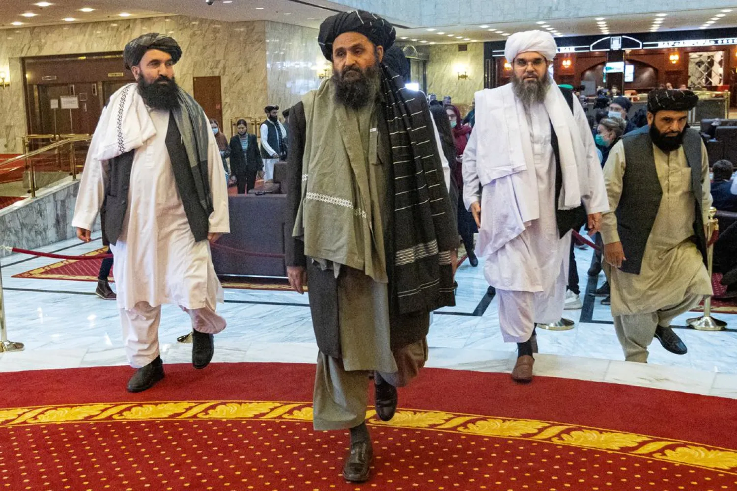 Mullah Abdul Ghani Baradar, the Taliban's deputy leader and negotiator, and other delegation members attend the Afghan peace conference in Moscow, Russia March 18, 2021. (Reuters)