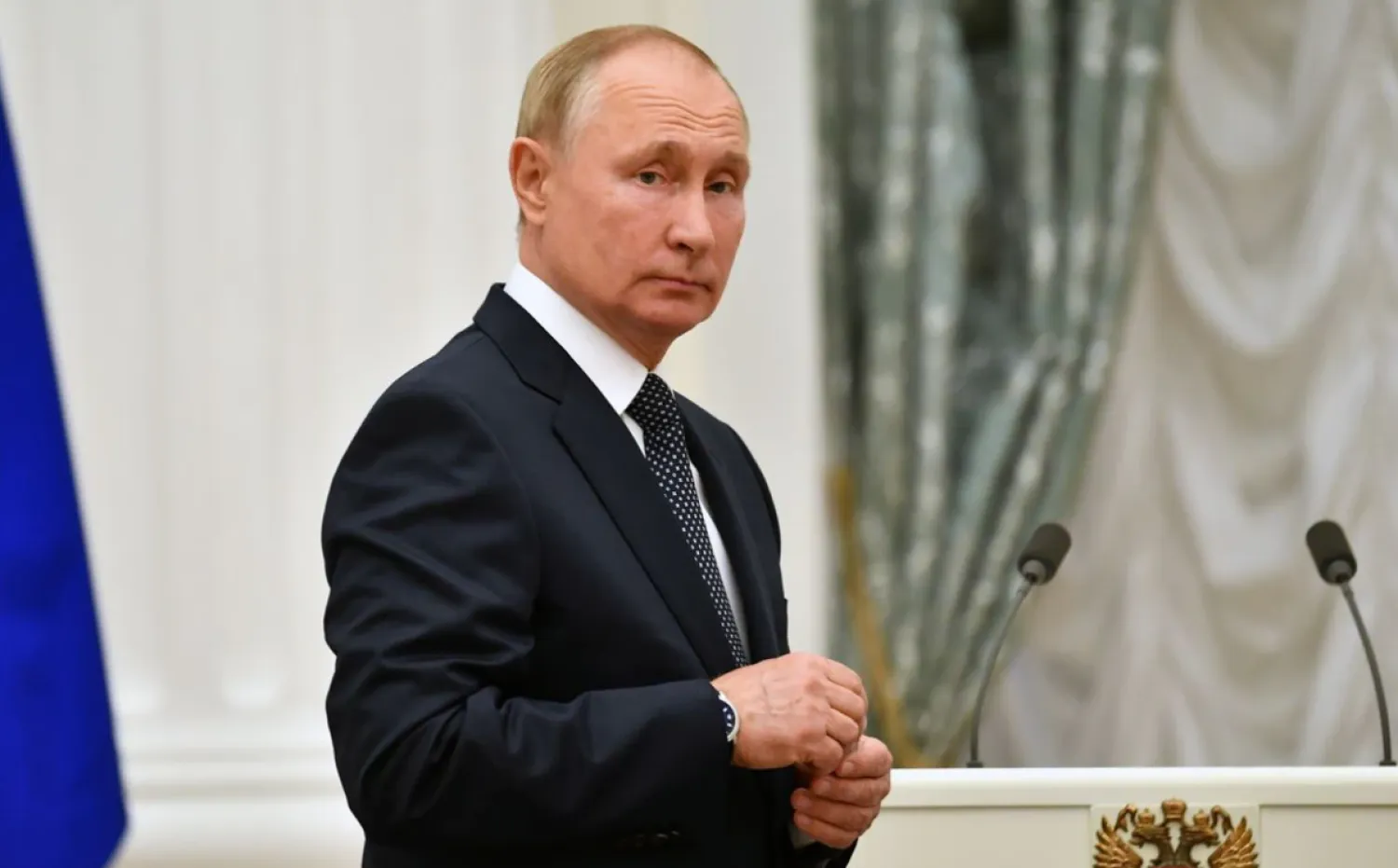 Russian President Vladimir Putin looks on during a meeting with athletes, participants of the 2020 Tokyo Olympic Games, in Moscow, Russia September 11, 2021. Sputnik/Evgeny Biyatov/Kremlin via REUTERS