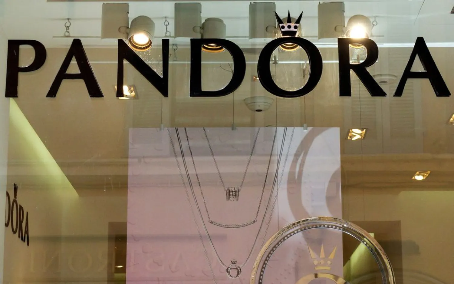 The Pandora logo is seen in jewelry shop in downtown Rome, Italy, August 7, 2018. (Reuters)
