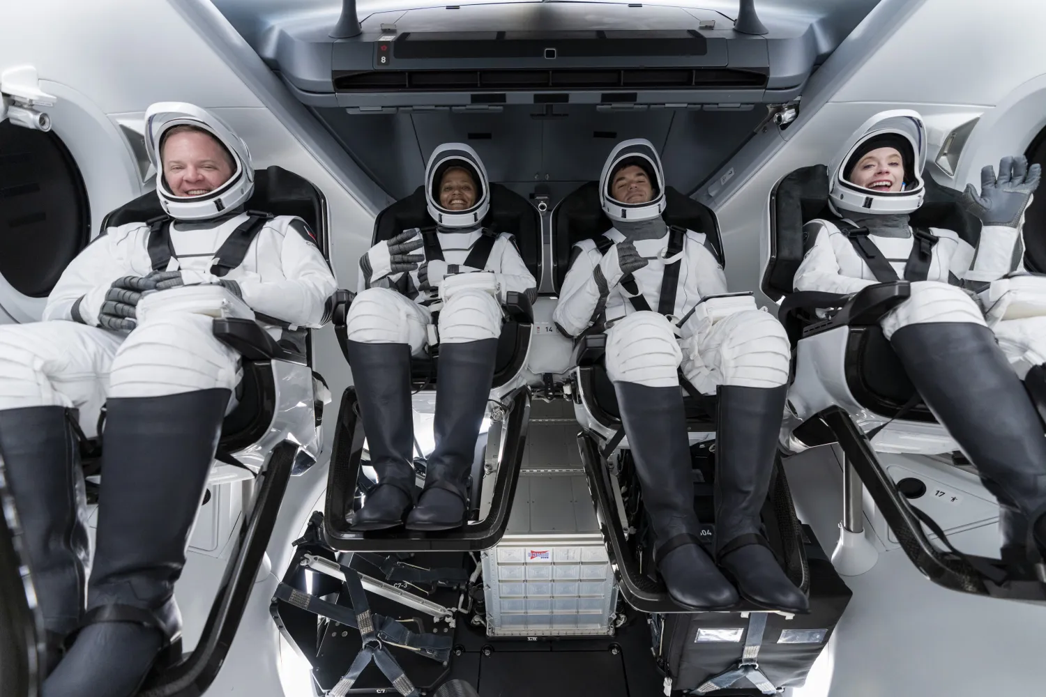 In this Sunday, Sept. 12, 2021 photo made available by SpaceX, from left, Chris Sembroski, Sian Proctor, Jared Isaacman and Hayley Arceneaux sit in the Dragon capsule at Cape Canaveral in Florida, during a dress rehearsal for the upcoming launch. (SpaceX via AP)