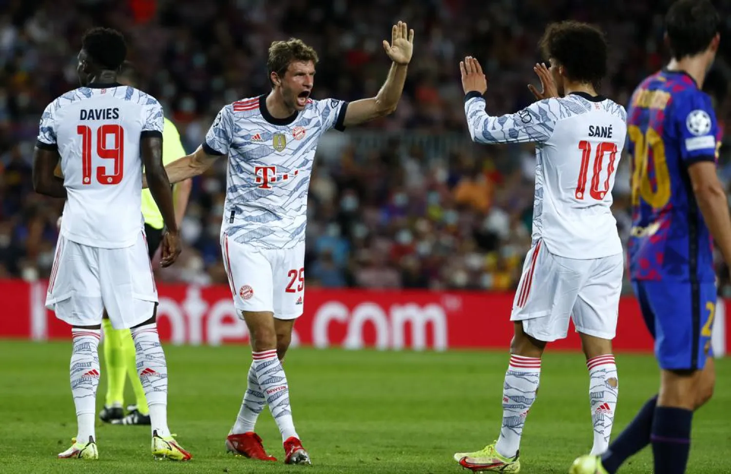 Bayern’s Thomas Mueller celebrates scoring the opening goal during the Champions League match between FC Barcelona and Bayern at Camp Nou stadium in Barcelona, Spain, Sept. 14, 2021. (AP)