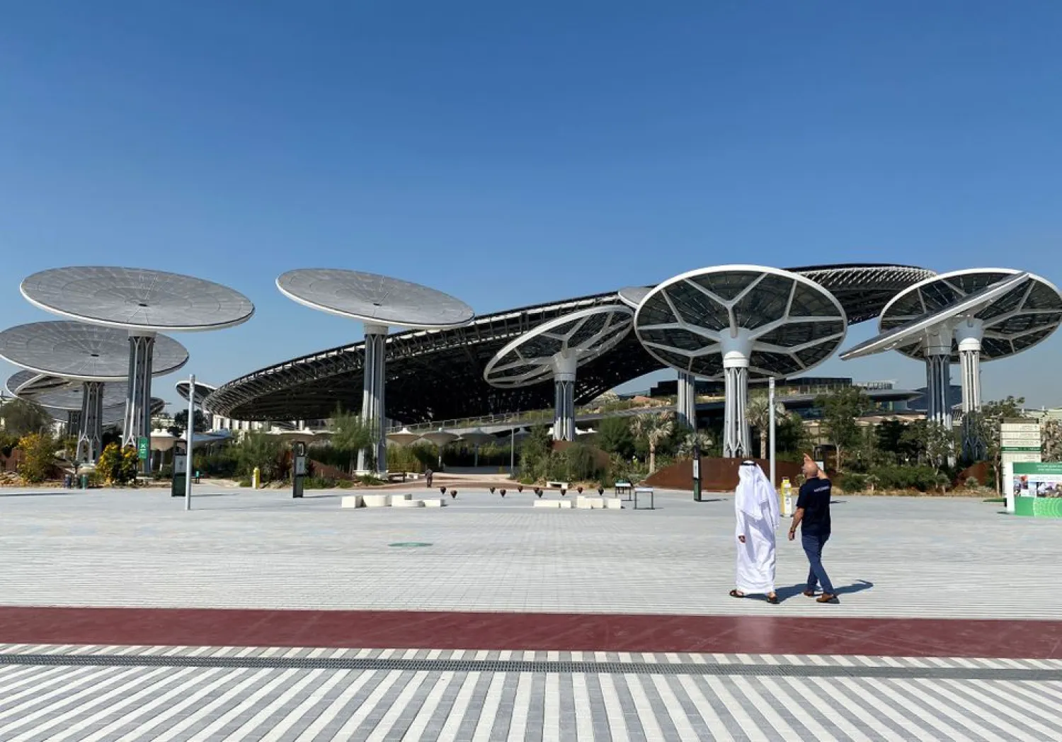 People walk at the site of Dubai Expo 2020 in Dubai, United Arab Emirates January 16, 2021. (Reuters)