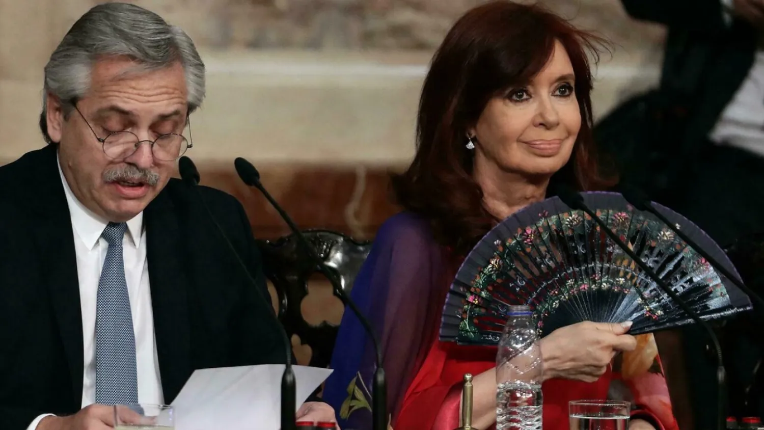 In this file photo taken in March 2020, Argentine President Alberto Fernandez (L) delivers a speech, next to Vice President Cristina Fernandez de Kirchner, ALEJANDRO PAGNI AFP/File
