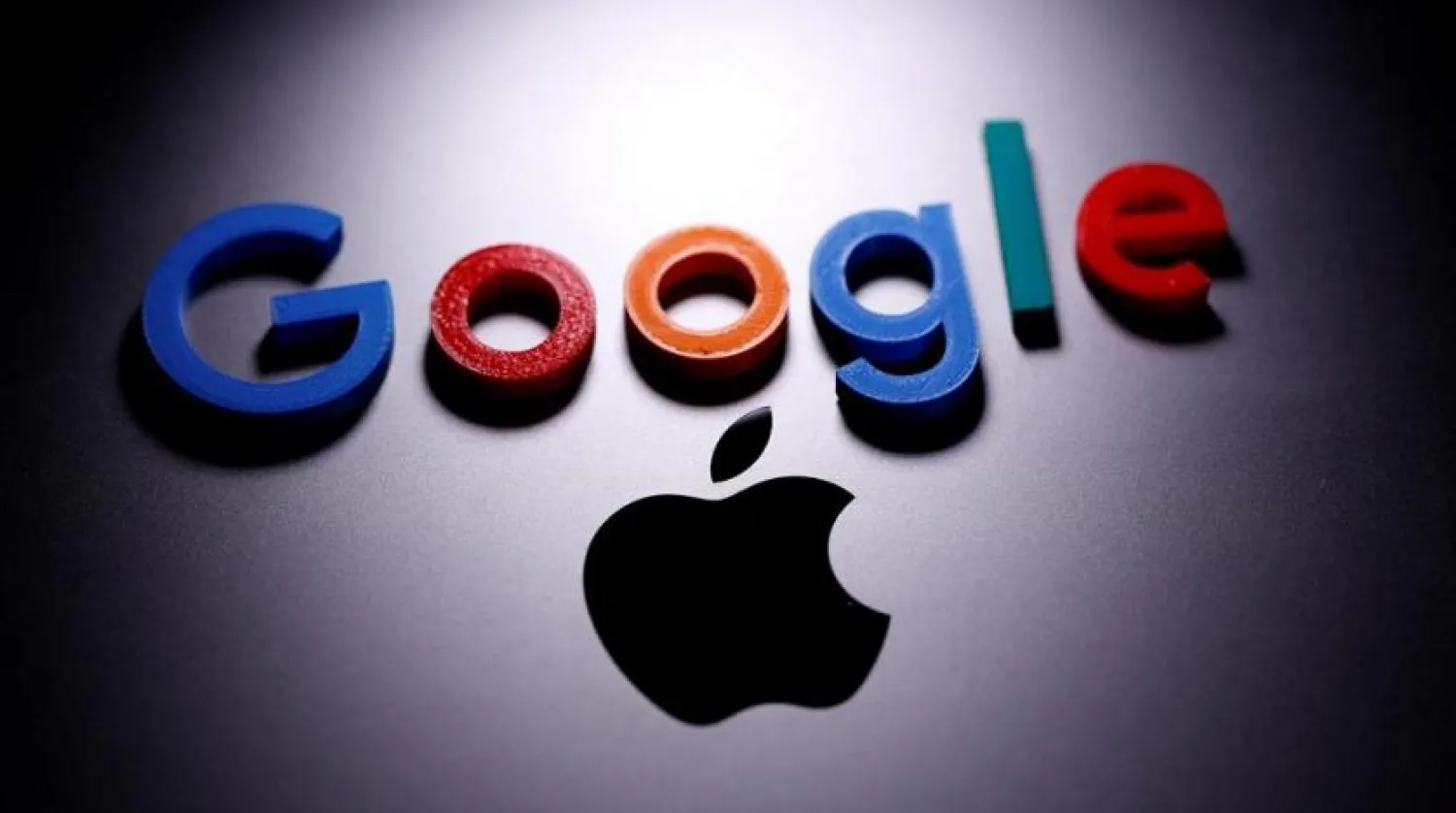 A 3D printed Google logo is placed on the Apple Macbook in this illustration taken April 12, 2020. (Reuters)
