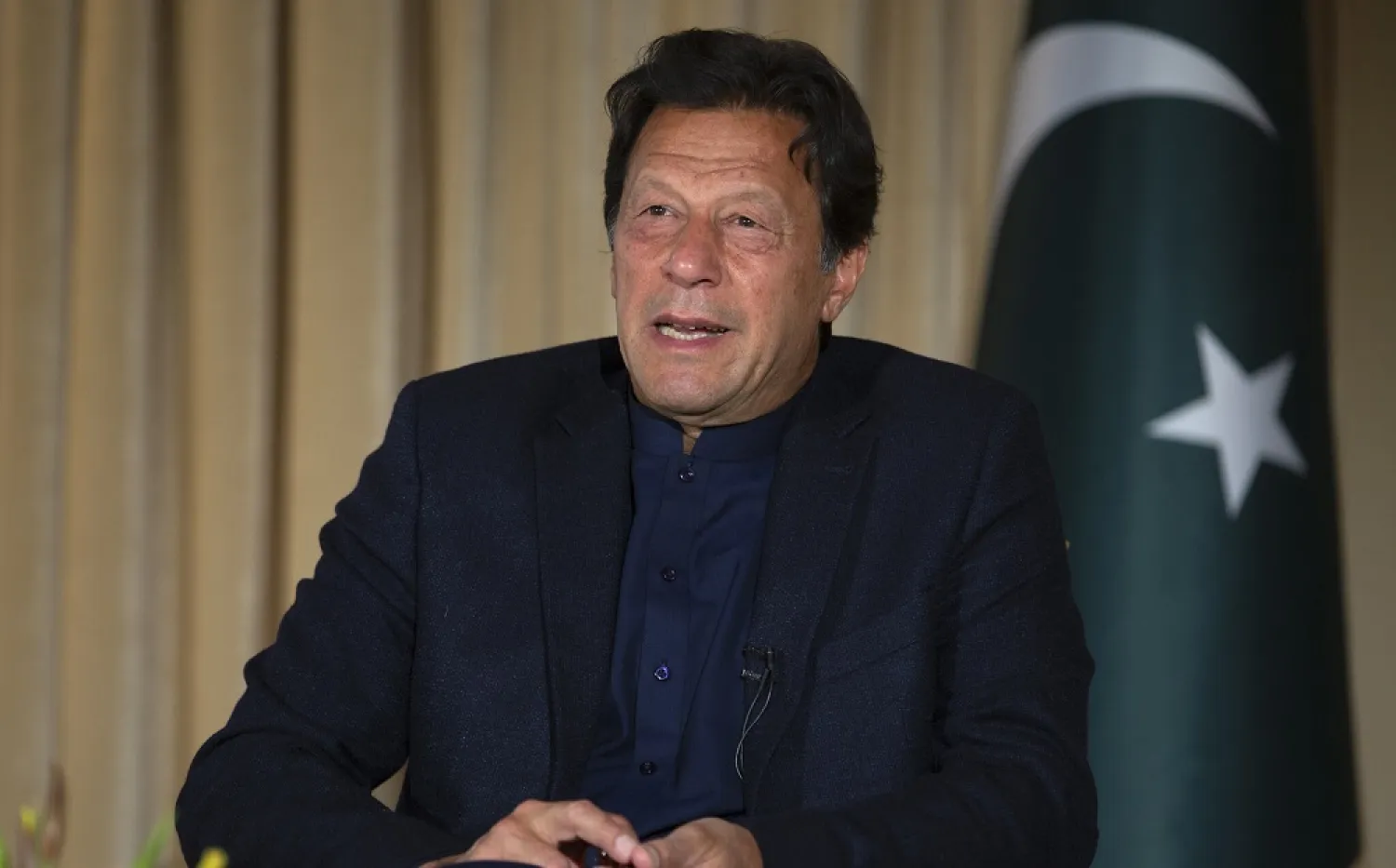 Pakistan’s Prime Minister Imran Khan speaks to The Associated Press, in Islamabad, Pakistan, Monday, March 16, 2020. (AP)