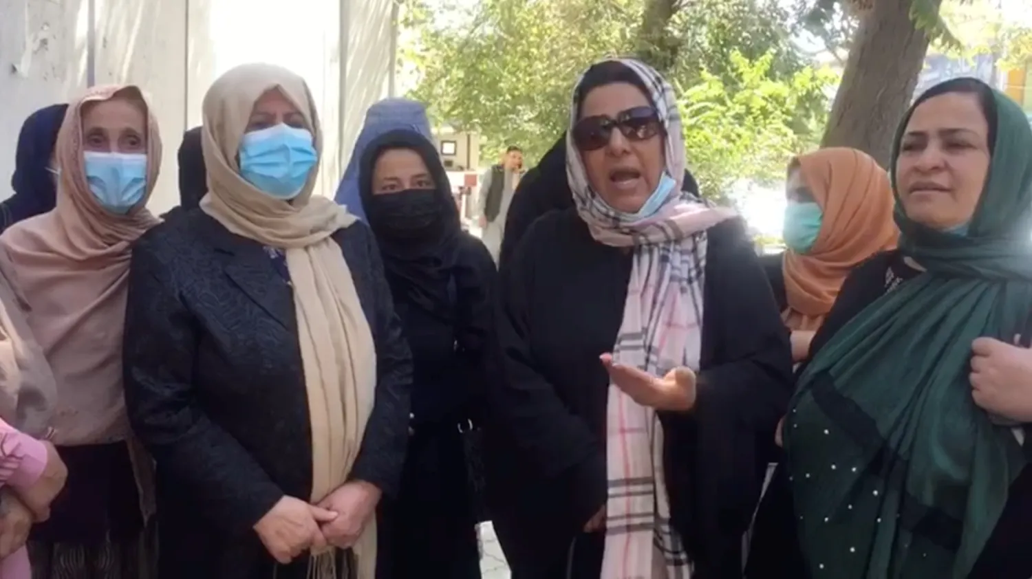A group of women gather for a protest in Kabul, Afghanistan, September 16, 2021 in this screengrab obtained from a social media video. Video taken September 16, 2021. ZAKIA KAWYAN/via REUTERS 