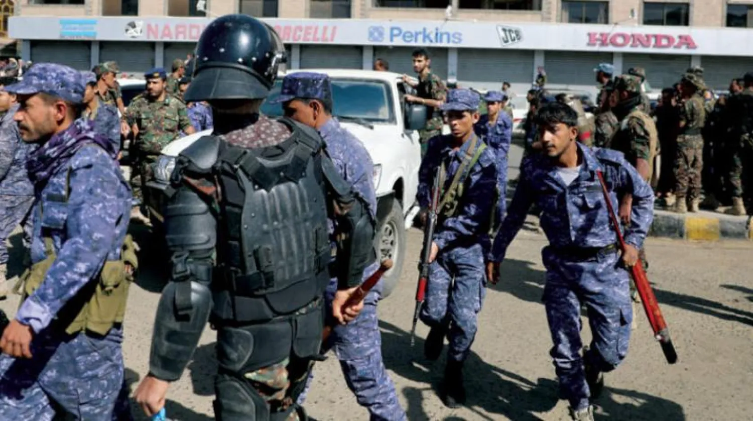 Houthi gunmen deploy on the streets on Sunday after the Sanaa execution. (Reuters)