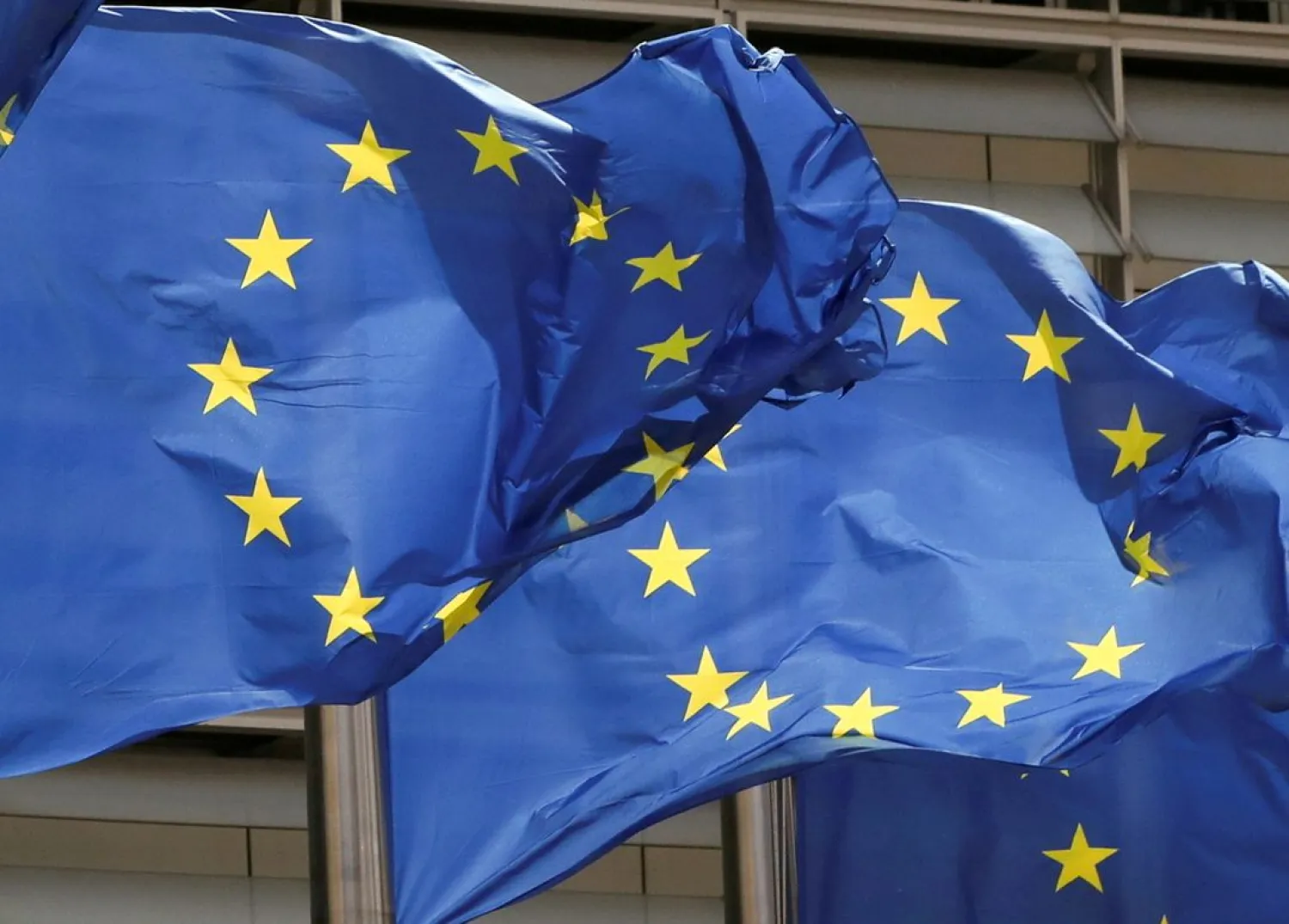 European Union flags flutter outside the EU Commission headquarters in Brussels, Belgium May 5, 2021. (Reuters)