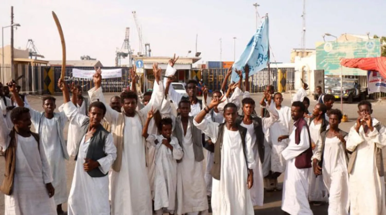 Sudanese protests at the entrance of Port Sudan (AFP)