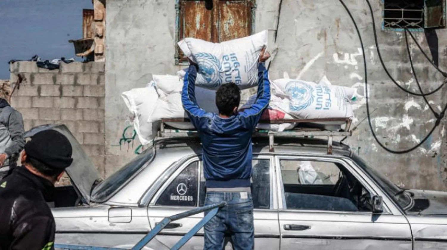 UNRWA aid is handed out in Gaza. (AFP)