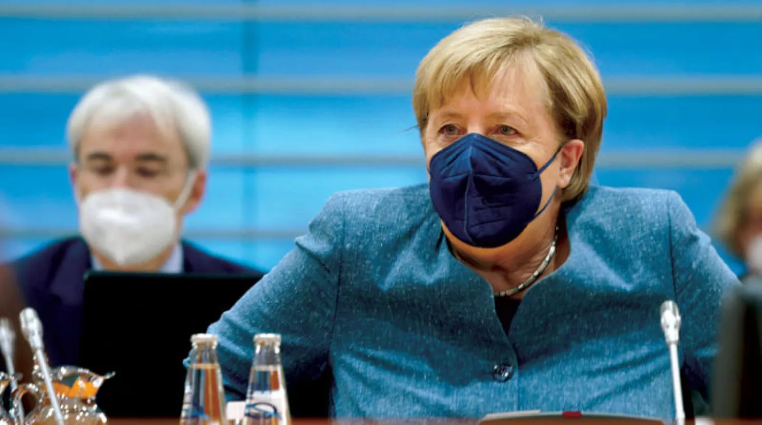 ميركل دعت للتصويت لدعم استمرارية النمو الاقتصادي في البلاد (إ.ب.أ)