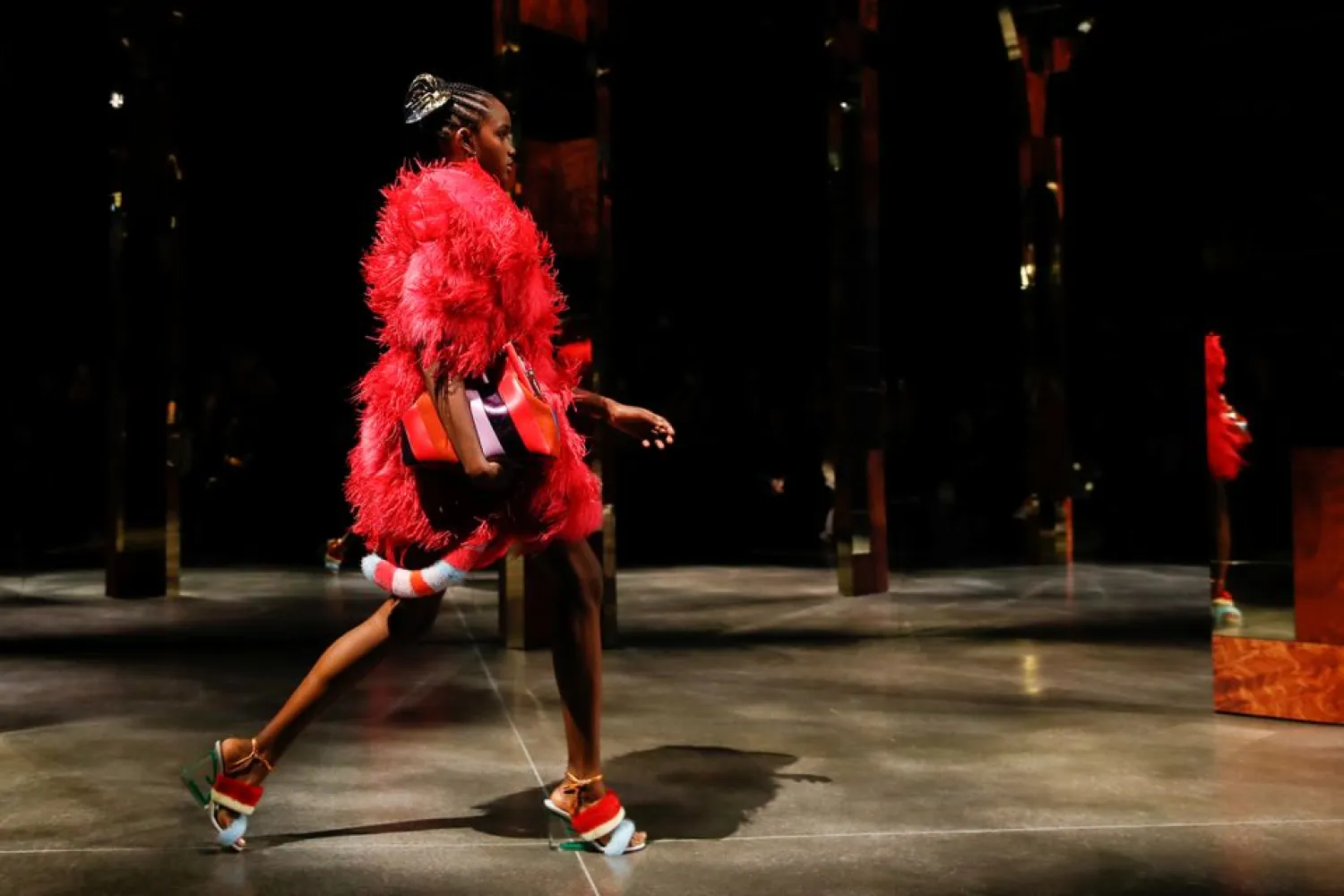 A model presents creations from the Fendi Spring/Summer 2022 collection during Milan Fashion Week in Milan, Italy, September 22, 2021. (Reuters)
