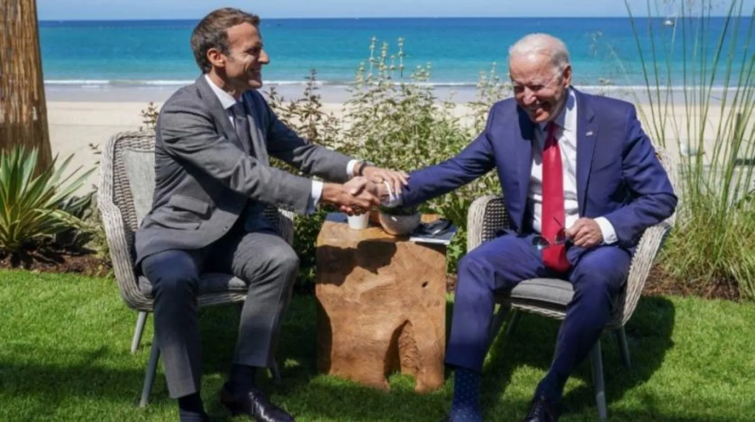 US President Joe Biden and France's President Emmanuel Macron shake hands as they attend a bilateral meeting during the G7 summit in Carbis Bay, Cornwall, Britain, June 12, 2021. (Reuters)
