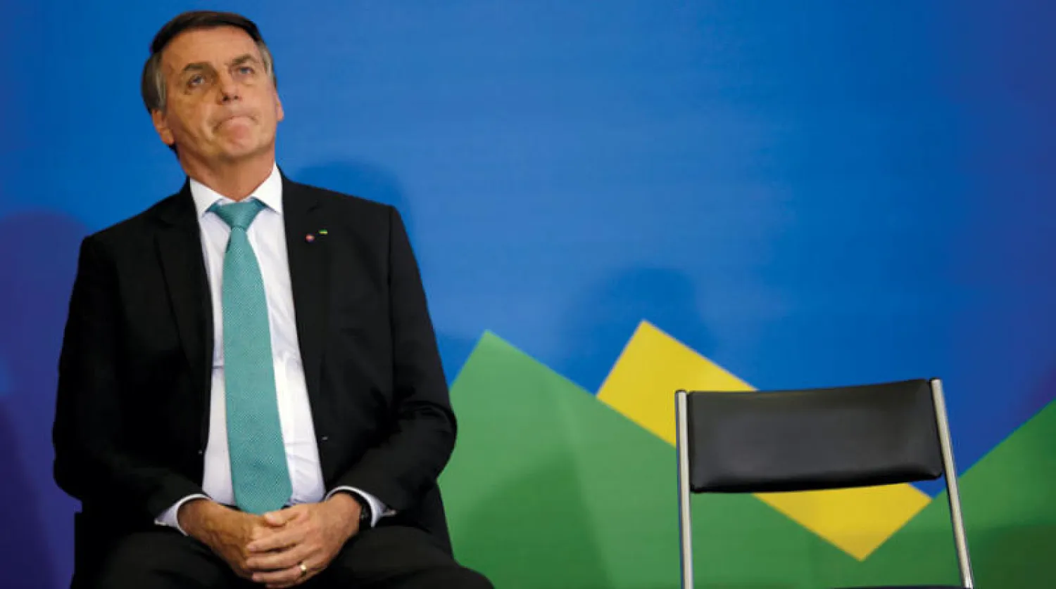 بولسونارو لدى حضوره احتفالاً بمناسبة مرور ألف يوم على وجوده في الرئاسة ببرازيليا أمس (رويترز)