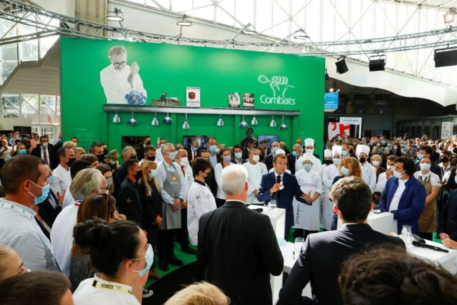 French President Emmanuel Macron speaks as he visits the International Catering, Hotel and Food Trade Fair (SIRHA) in Lyon, France, September 27, 2021. (Reuters)