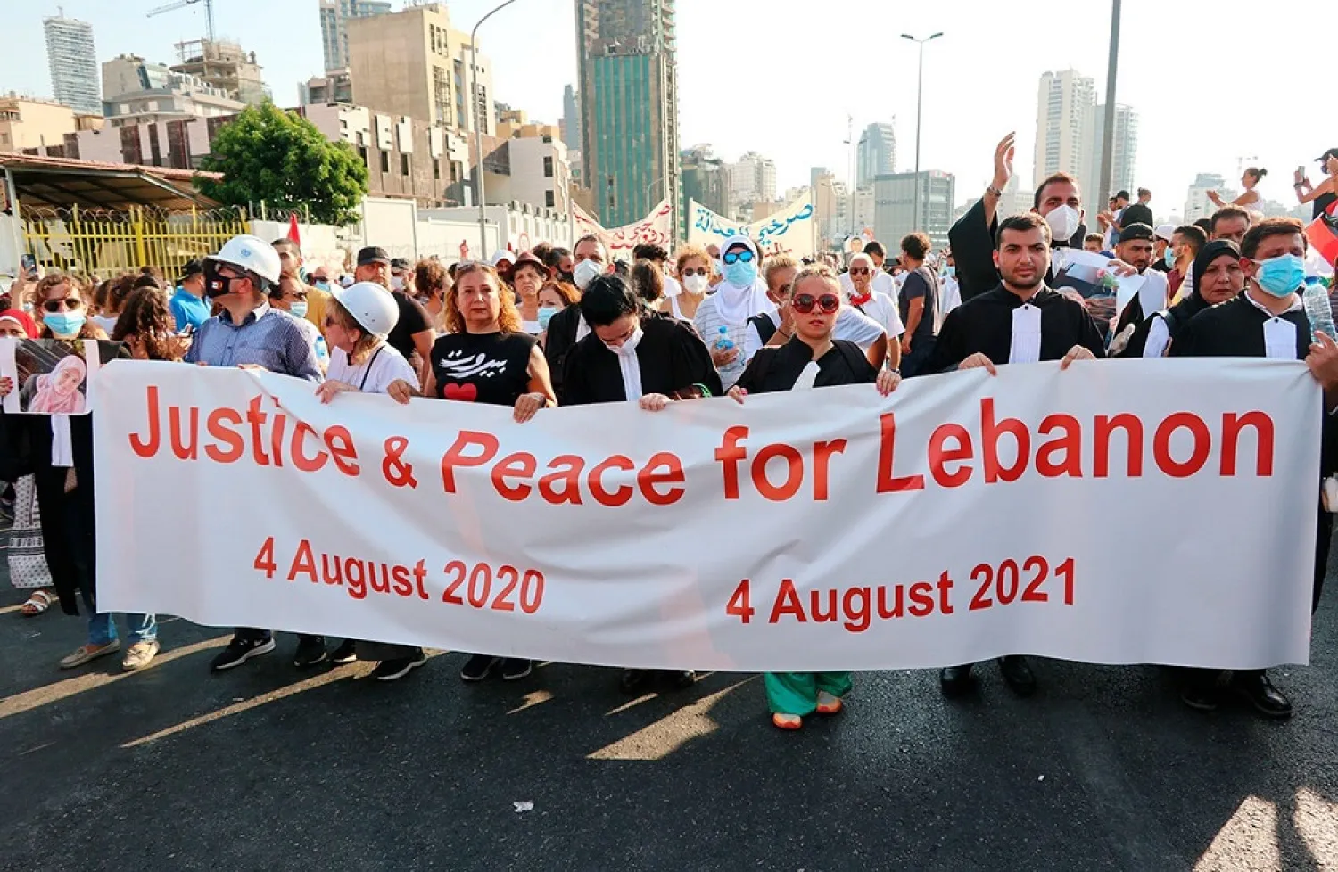 The Lebanese Association of Lawyers march at the first anniversary of the port blast, Beirut, Lebanon, on August 4, 2021. (AP)