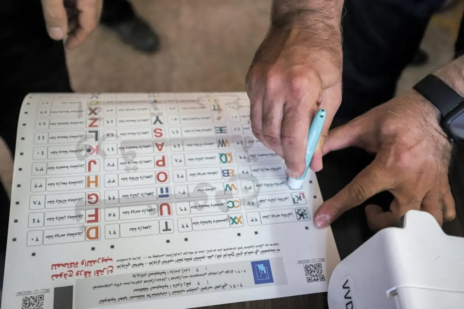 Officials of Iraq's electoral commission undergo a polling day simulation to test run its systems ahead of the upcoming parliamentary elections on September 22, 2021. (Getty Images)