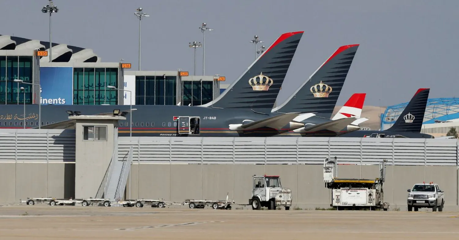 Planes that belong to the Royal Jordanian Airlines and other companies are parked at the Queen Alia International Airport in Amman, Jordan February 23, 2020. (Reuters)