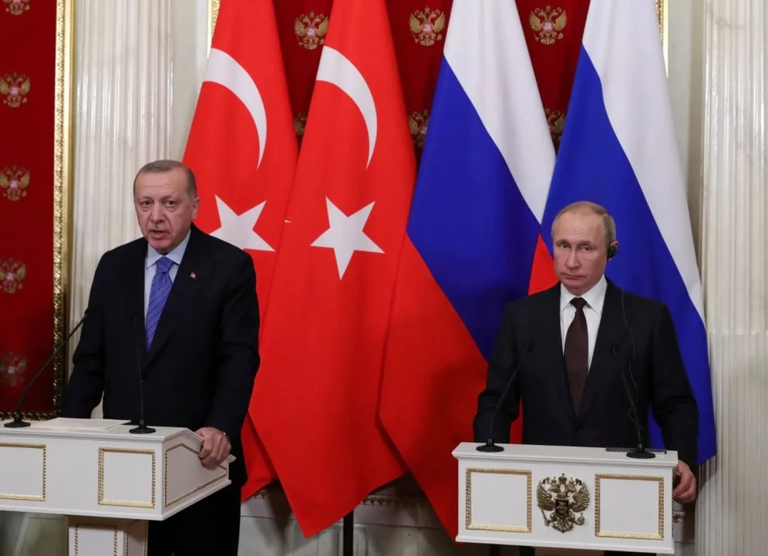 Russian President Vladimir Putin and Turkish President Recep Tayyip Erdogan attend a news conference following their talks in Moscow, Russia March 5, 2020. (Reuters)