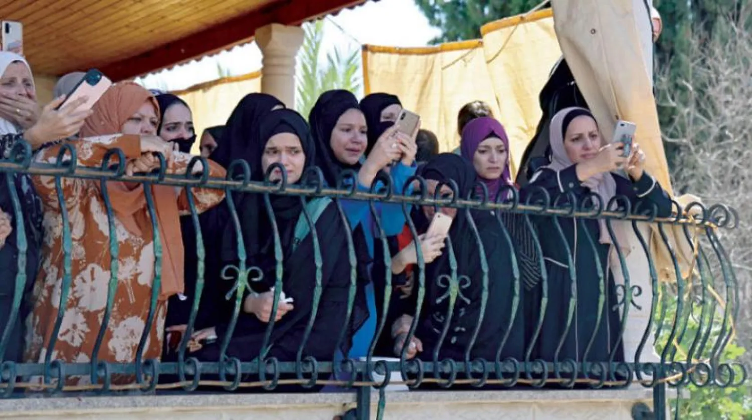 Relatives of one of the five people killed in the Israeli operation in the West Bank on Sunday (AFP).

