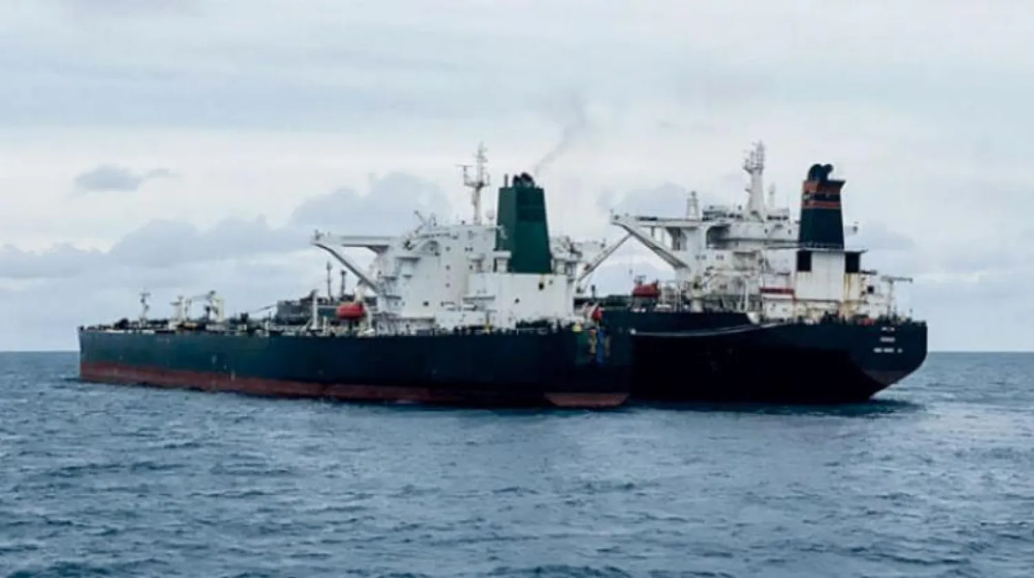 Panamanian-flagged MT Freya and the Iranian-flagged MT Horse vessels are seen anchored in the waters off Pontianak, West Kalimantan province, Indonesia, January 24, 2021 in this photo taken by Antara Foto. Antara Foto/via REUTERS