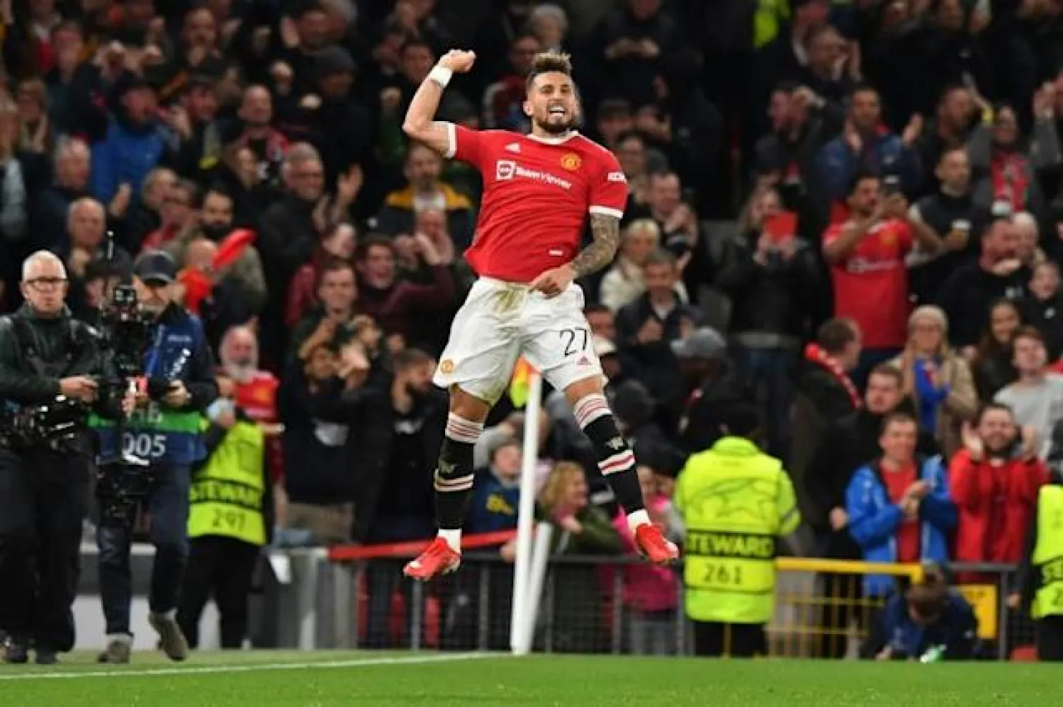 Alex Telles celebrates his first Manchester United goal (AFP/Anthony Devlin)
